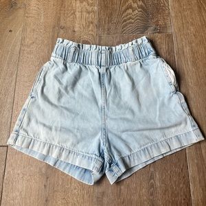 Girls high waisted light wash blue jean shorts